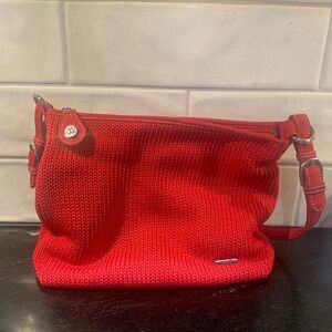 The SAK red crocheted shoulder bag